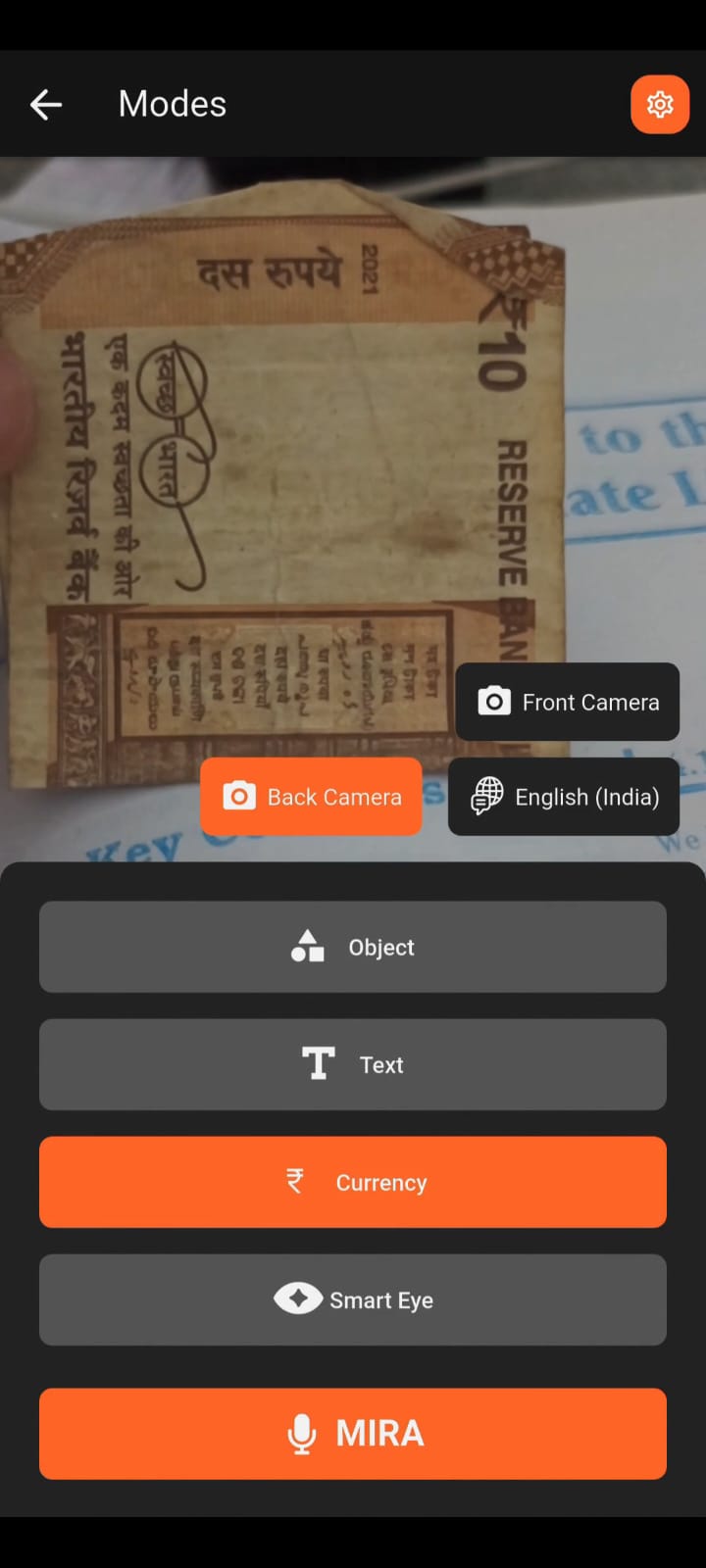 SMARTON Currency Recognition screen identifying Indian Rupee notes with denomination announcement